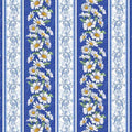 Decorative fabric pattern with daisies and floral designs on a blue background