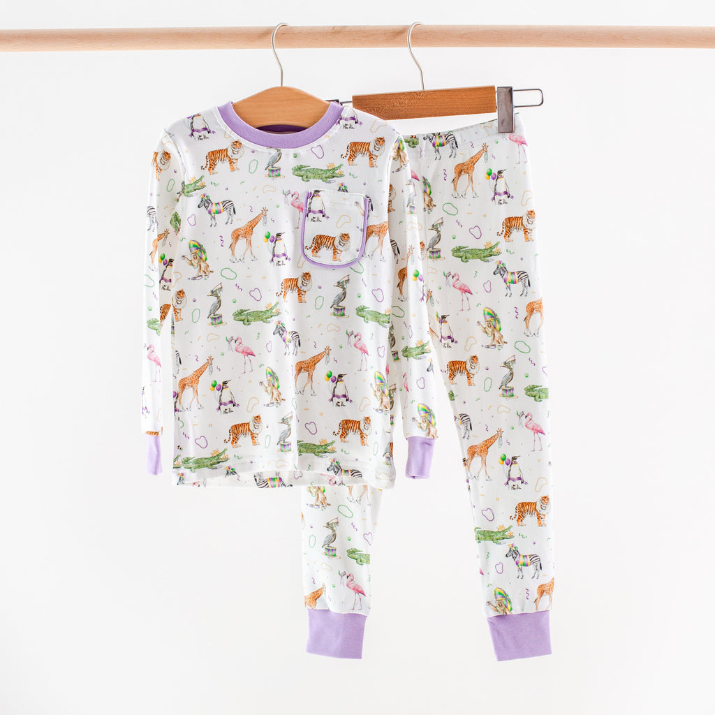Children's pajama set with animal pattern on a white background