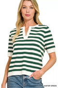 Woman wearing a green and white striped shirt with text 'HUNTER GREEN' on a white background