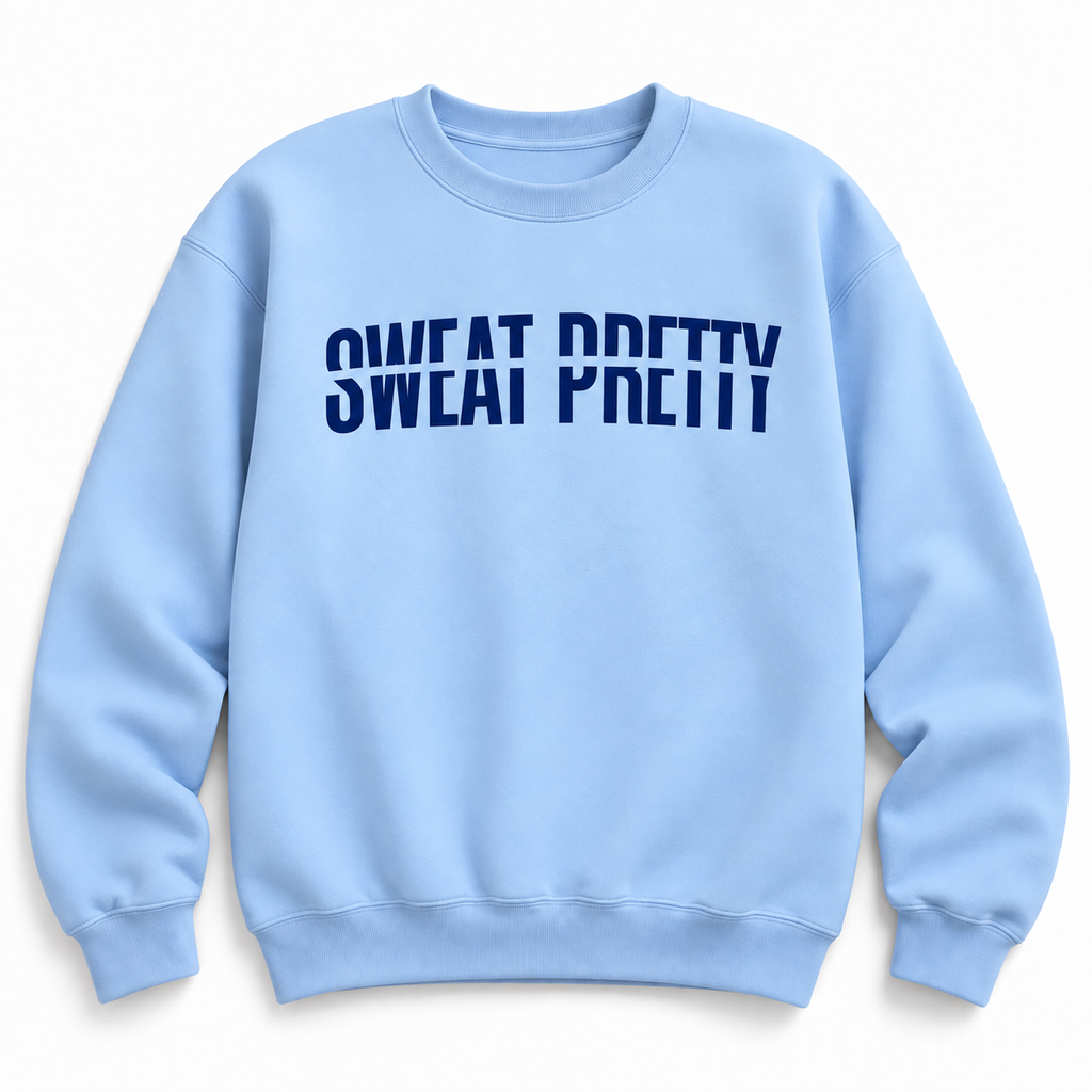 A light blue crewneck sweatshirt with the text 'SWEAT PRETTY' printed across the chest in dark blue block letters, displayed on a clean white background.