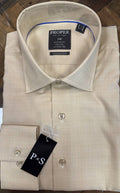 A folded beige dress shirt with a subtle windowpane check pattern, featuring a collar label for 'PROPER Suits' and a black 'P+S' hangtag on the cuff, displayed on a dark wood background.