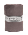 Folded fabric with 'Cuddle Cats' label on a white background
