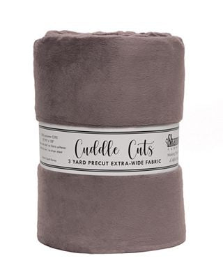 Folded fabric with 'Cuddle Cats' label on a white background