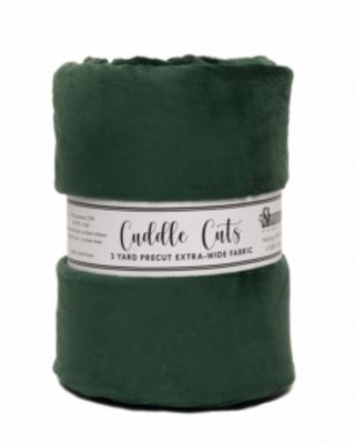 A dark green roll of Cuddle Cuts precut fabric, wrapped in a white paper band showing the brand name 'Shamrock Fabrics'.