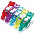 Set of colorful paper clips on a white background