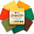 A bundle of fabric squares in multiple autumn colors arranged in a circle around a white paper label that reads 'Choice Fabrics Smudge of Color Harvest Tones 5" x 5" Charm Pack 42 squares.' Visible colors include yellow, orange, red, green, teal, olive, and brown.