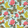 Pattern of butterflies, flowers, and dragonflies on a light blue background