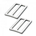 Two silver-toned metal belt buckle plates with a polished finish, shown on a plain white background.