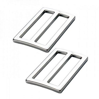 Two silver-toned metal belt buckle plates with a polished finish, shown on a plain white background.