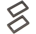 Two black rectangular rubber grommets or mounting rings shown on a plain white background.