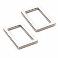 Two rectangular silver frames on a white background