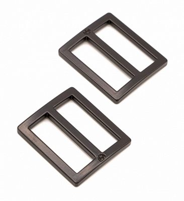 Two black metal rectangular slider rings with a matte finish, displayed on a clean white background.