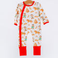 Children's onesie with cowboy pattern on a hanger against a white background