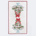 Decorative towel with oyster design and red bows on a white background