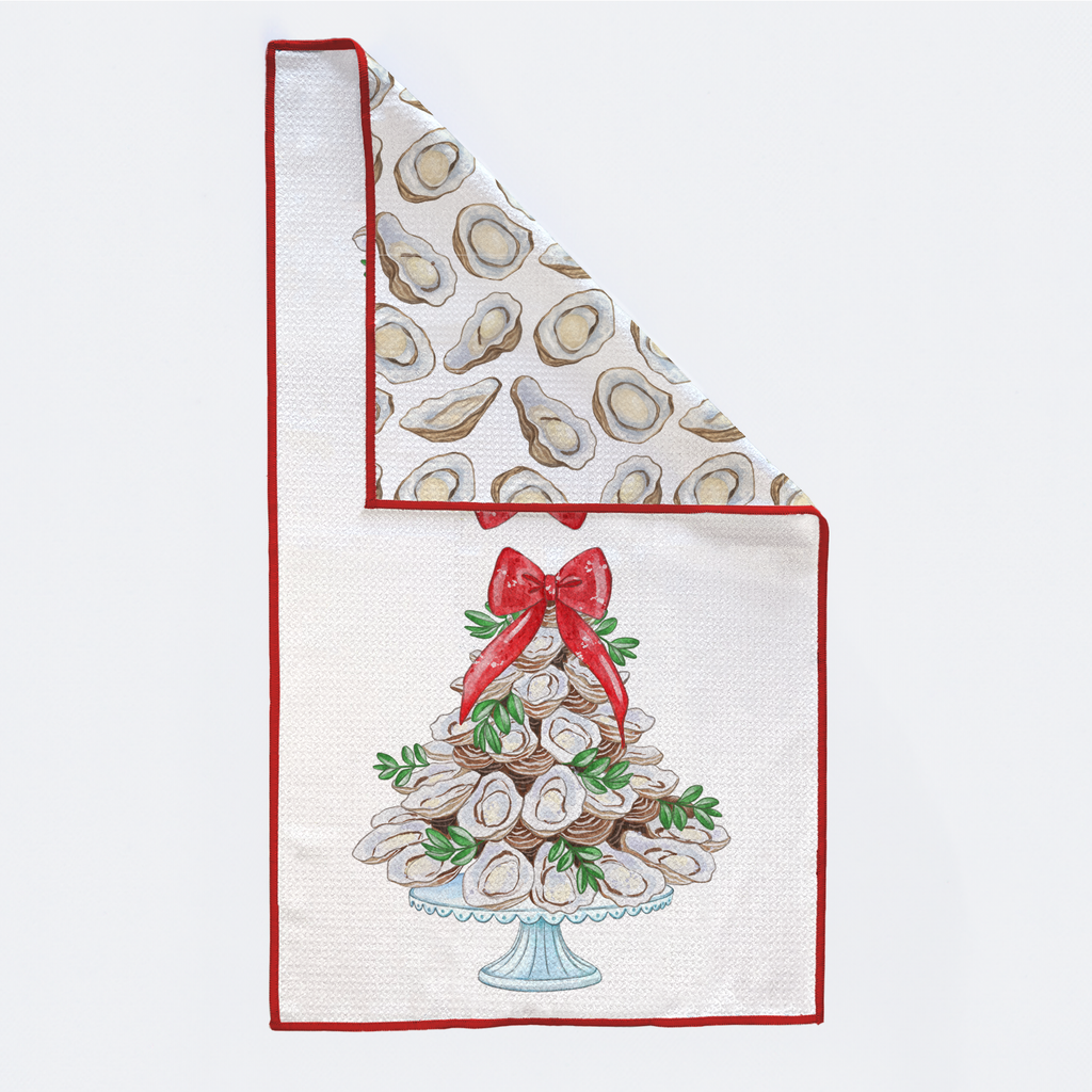 Set of two kitchen towels with oyster design and red ribbon on a white background