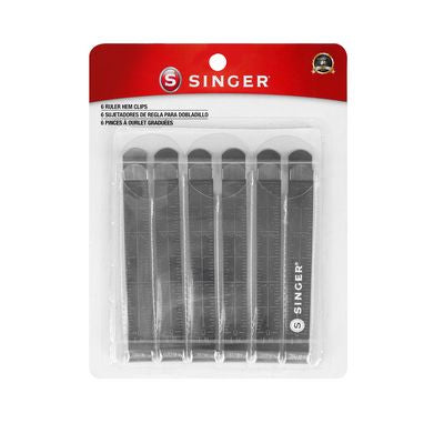 Set of Singer needles in a package on a white background