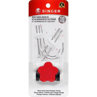 Singer heavy fabric repair kit packaging with needles and a flower-shaped tool on a white background