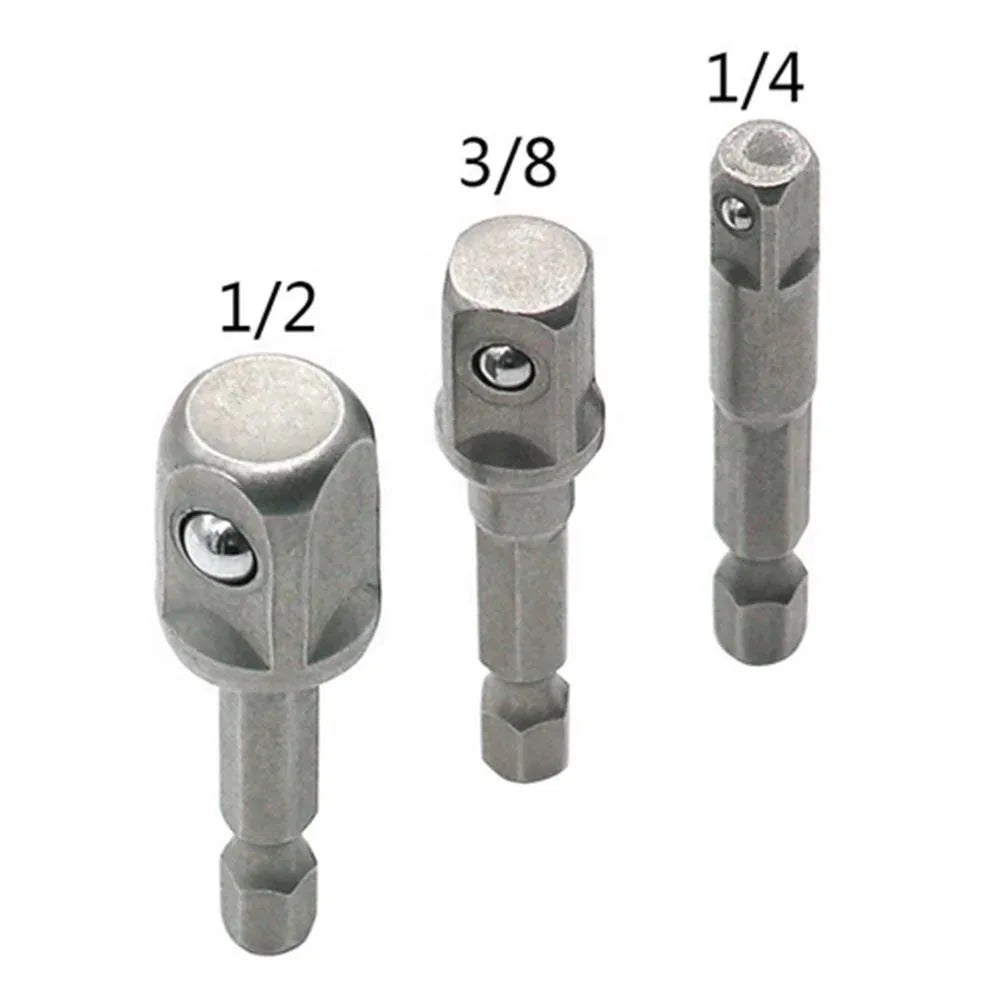 Three metallic drill bits of different sizes on a white background