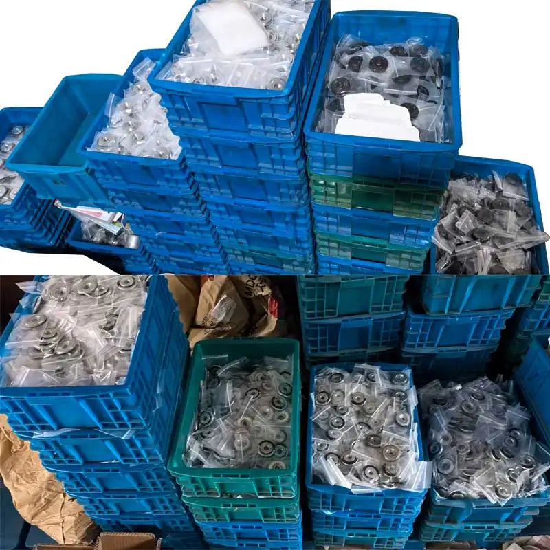 Stacks of blue crates containing various mechanical parts on a white background
