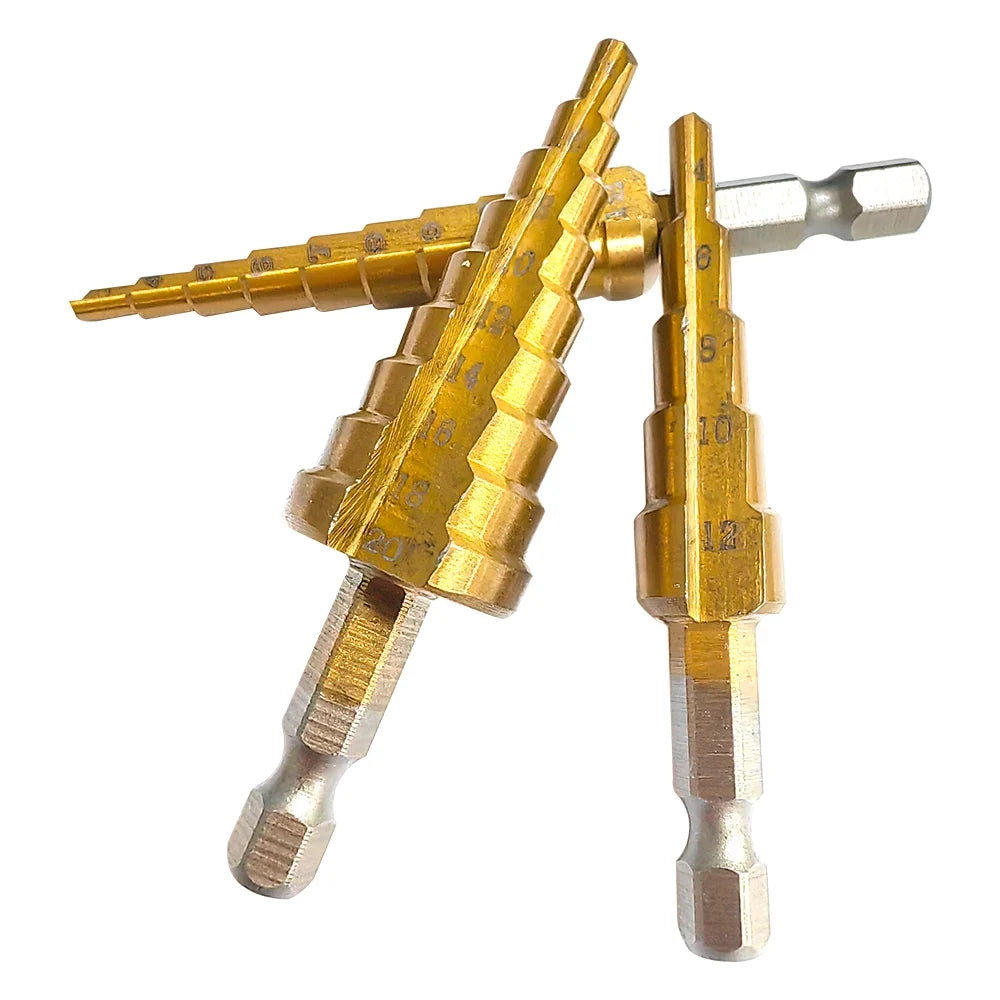Set of gold drill bits on a white background