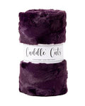 Purple plush fabric with 'Cuddle Cuts' label on a white background
