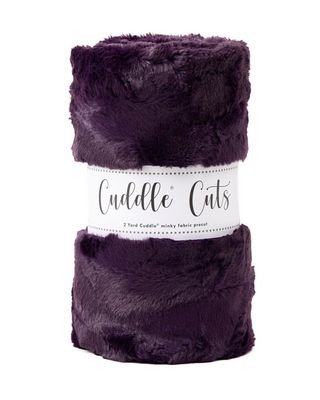 Purple plush fabric with 'Cuddle Cuts' label on a white background