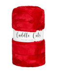 Red plush fabric with 'Cuddle Cuts' label on a white background
