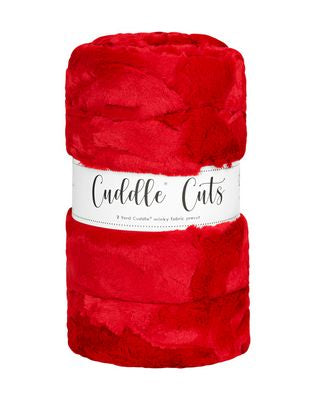 Red plush fabric with 'Cuddle Cuts' label on a white background