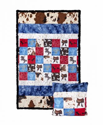 Quilt with dog-themed blocks on a white background