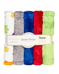 A set of six rolled plush fabric strips in assorted colors, wrapped together with a paper band labeled 'Sweet Strips' and 'Shannon'. The colors include white, gray, blue, red, and light green, with some blankets showing small printed paw prints.