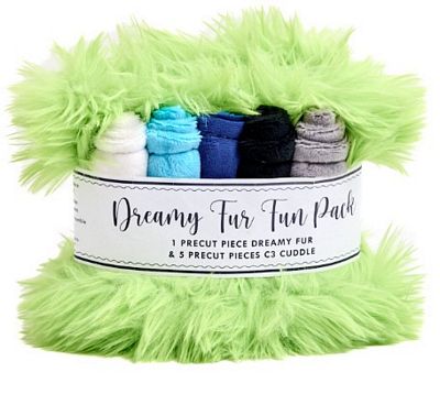 Dreamy Fur Fun Pack containing a fluffy lime green dreamy fur piece and three folded precut pieces in white, light blue, navy, and gray, wrapped in a white paper band.
