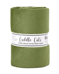 An olive green fleece blanket rolled into a cylinder with a white paper label band, shown against a plain white background.