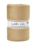 Roll of beige fabric with a label on a white background