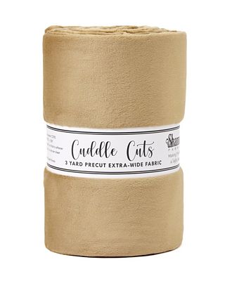 Roll of beige fabric with a label on a white background
