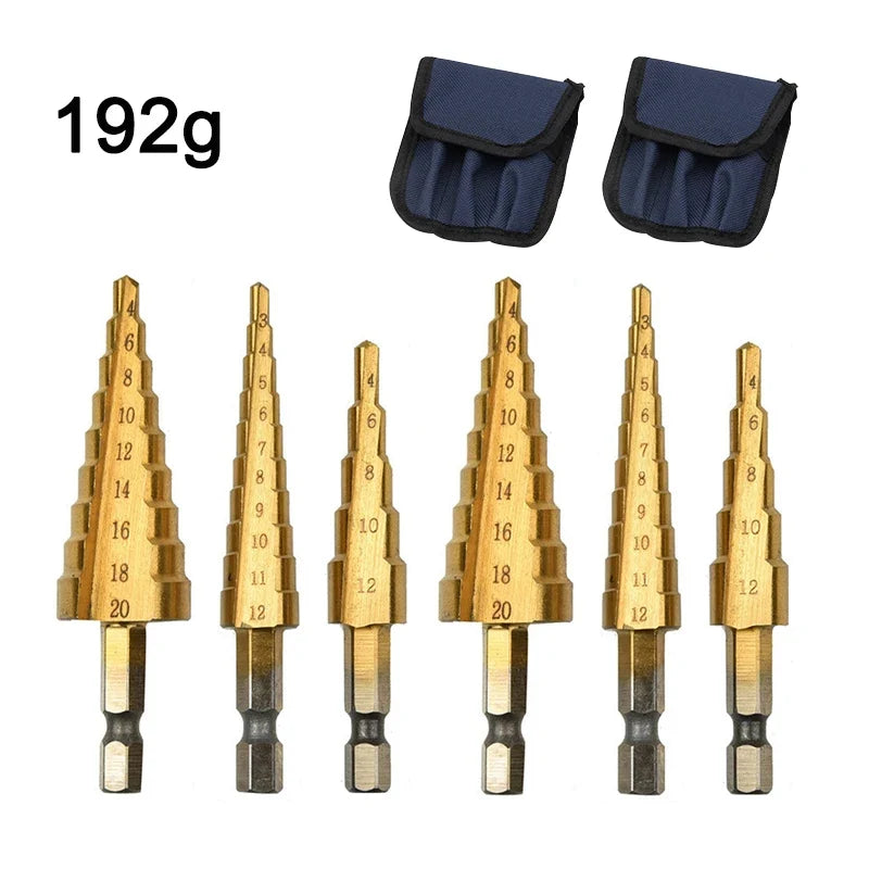 Set of six gold drill bits with black handles and two blue carrying cases on a white background.