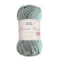 Ball of light blue yarn with a label on a white background