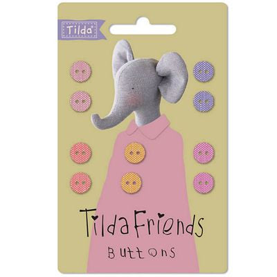 Packaging of Tilda Friends buttons with a gray elephant toy and colorful buttons on a beige background.