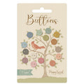 Buttons by Poppys Seed scrapbook paper pack featuring a tree with patterned button-shaped leaves and a small bird, on a cream-colored backing card.