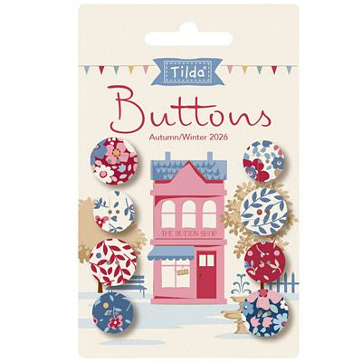 Tilda Buttons Autumn/Winter 2026 carded pack containing 12 decorative buttons with various patterns including florals, stripes, and dots in red, blue, pink, and white.