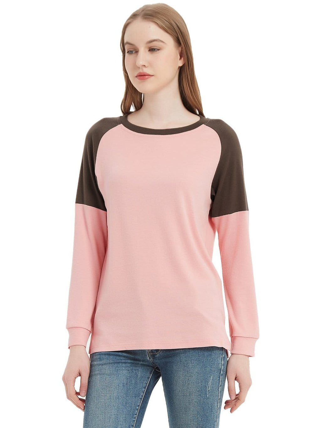 Woman wearing a pink and brown long-sleeve shirt on a white background