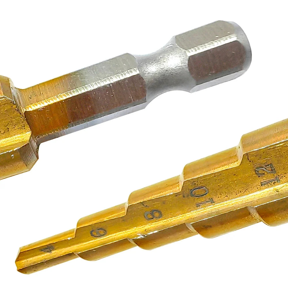 Close-up of a set of brass and steel pipe thread tap bits with engraved size markings, shown on a plain white background.