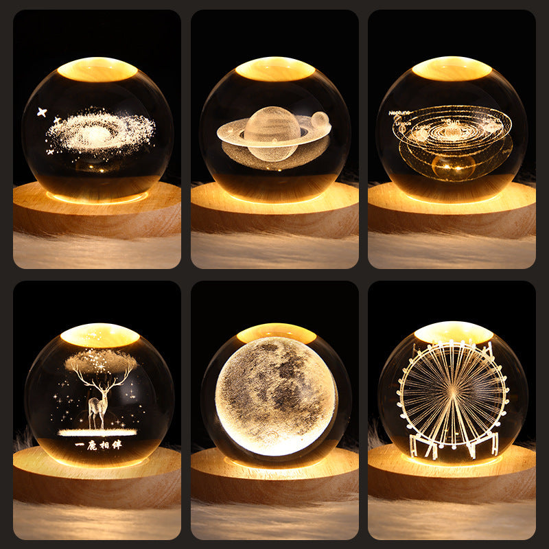 Collage of six crystal ball night lights with different designs on a wooden base.