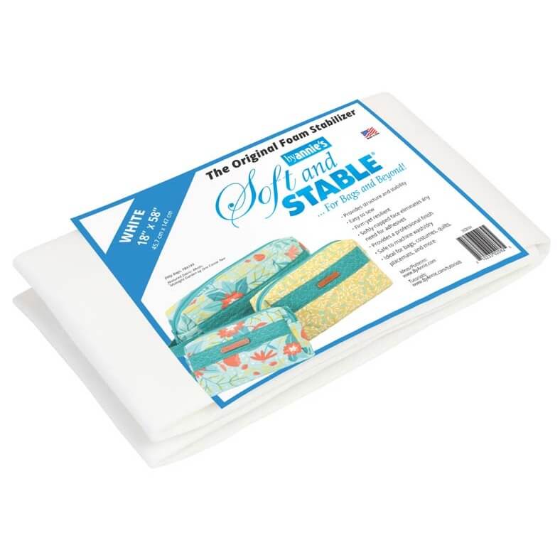 A packaged white foam stabilizer sheet for bags and binders, shown on a clean white background. The product is folded and wrapped in a paper sleeve featuring blue and white branding and an illustration of colorful binders.