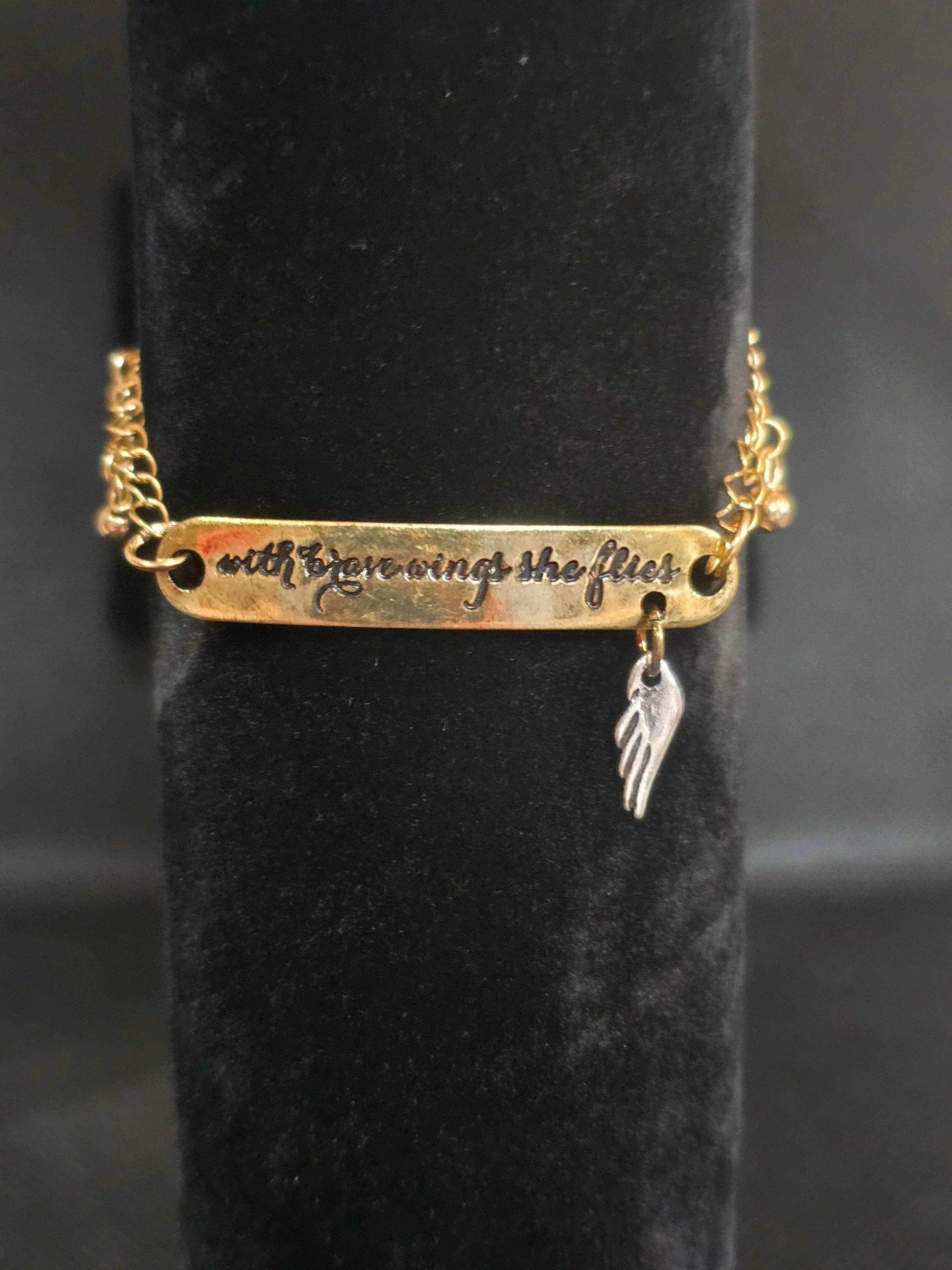 With Brave Wings She Flies Gold Color Metal Bracelet with Silvery color Wing Charm