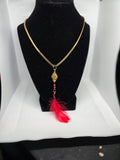 Golden Colored Diamond Shaped Basket Pendant With Red Feather on a Golden Color  Plastic Snake Chain