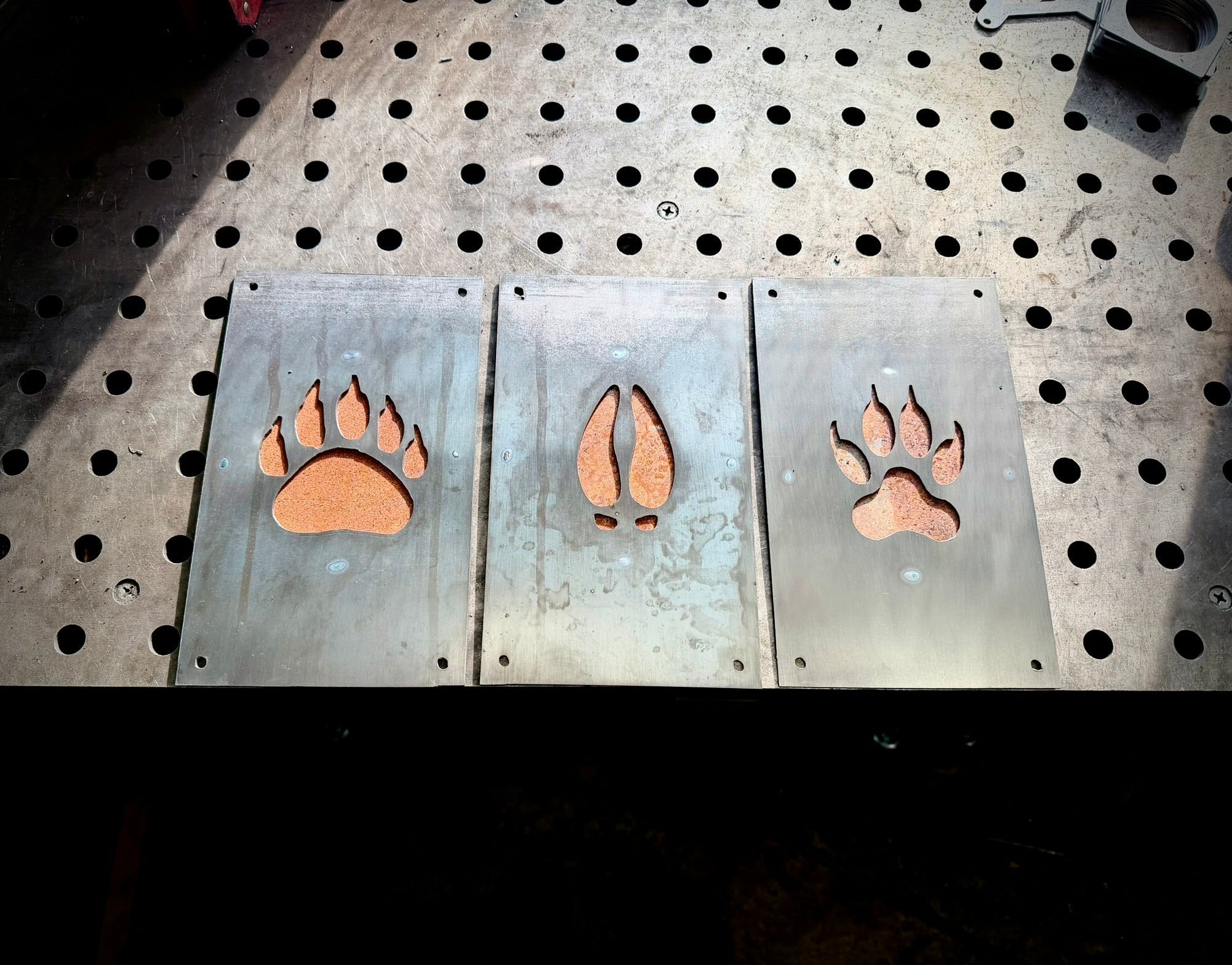 Trail of the Wild – Animal Tracks Layered Steel Wall Art